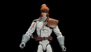 Shatterstar In Action, Wielding His Iconic Dual-bladed Sword And Ready For Combat Wallpaper