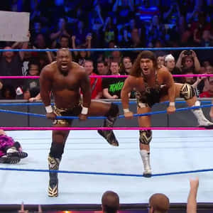 Shelton Benjamin And Chad Gable In The Heat Of A Fatal 4-way Match Wallpaper