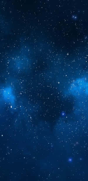 Shining Bright In The Night Sky, Experience The Beauty Of Blue Stars. Wallpaper