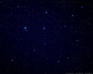 Shining Brightly In The Night Sky, These Four Bright Blue Stars Light Up The Night. Wallpaper