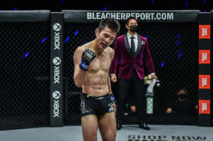 Shinya Aoki Celebrating Win Over Eduard Folayang Wallpaper