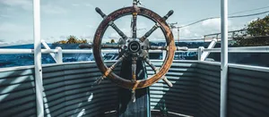 Ship's_ Wheel_and_ Deck_ View.jpg Wallpaper