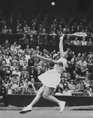 Shirley Fry Irvin At The 1956 Wimbledon Championships Wallpaper