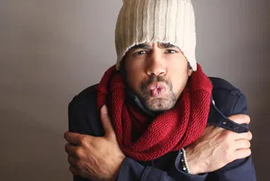 Shivering Man Hugging Himself [wallpaper] Wallpaper