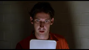 Shocked Manin Orange Jumpsuit Wallpaper