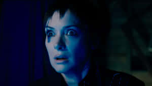 Shocked Woman Blue Lighting Wallpaper