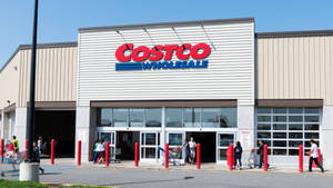 Shoppers Browsing Various Products At Costco Wallpaper