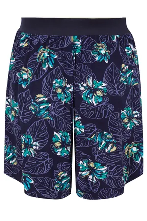 Show Off Your Confidence With A Stylish Pair Of Purple Shorts Wallpaper