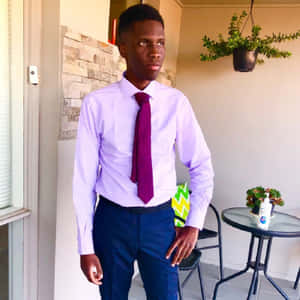 Show Off Your Exquisite Style With A Purple Tie Wallpaper