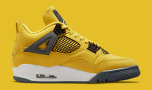 Show Your Support For The Jumpman With The Yellow Jordan Wallpaper