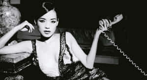 Shu Qi Striking A Pose In A Stunning Photoshoot Wallpaper