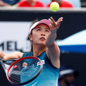 Shuai Peng Tossing Ball In Air Wallpaper