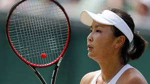 Shuai Peng With Her Racket Wallpaper