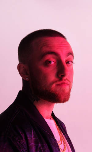 Side Profile Of Mac Miller In Pink Wallpaper