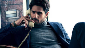 Sidharth Malhotra On The Phone Wallpaper