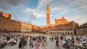 Siena Pubblico Palace With Many People Wallpaper