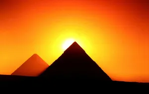 Silhouette Of Giza Pyramids At Sunset Wallpaper