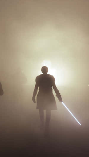 Silhouetteof Jediwith Lightsaber Wallpaper