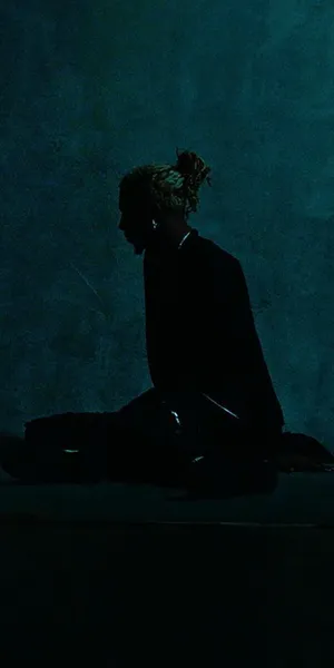 Silhouetteof Manin Darkness Wallpaper