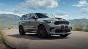 Silver Dodge Durango S U V Mountain Roadside Wallpaper