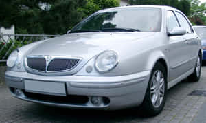 Silver Lancia Lybra Parked Outdoors Wallpaper