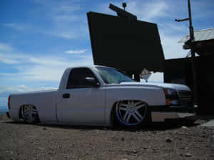 Silver Lowered Truck Outdoor Scene Wallpaper