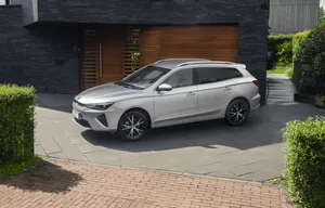 Silver M G5 Estate Parked Outside Modern Home Wallpaper