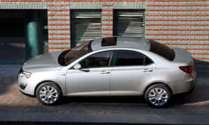 Silver M G550 Sedan Parked Wallpaper