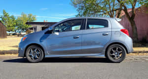 Silver Mitsubishi Mirage Side View Wallpaper