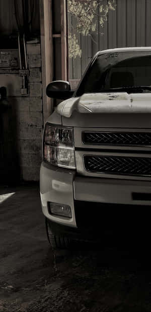 Silver Pickup Truck Garage Scene Wallpaper