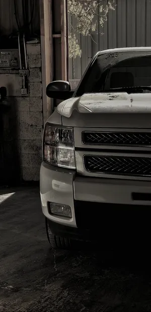 Silver Pickup Truck Garage Scene Wallpaper