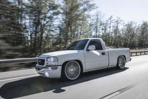 Silver Pickup Truck Speeding Wallpaper