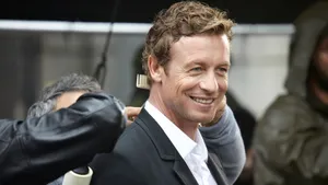Simon Baker Smiling During Event Wallpaper