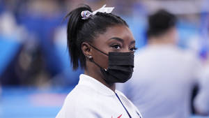 Simon Biles With Mask Wallpaper