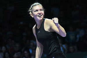 Simona Halep In Black Sportswear Wallpaper