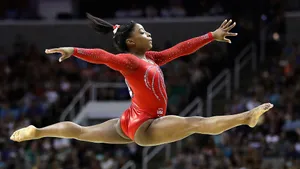 Simone Biles - A Champion American Artistic Gymnast Wallpaper