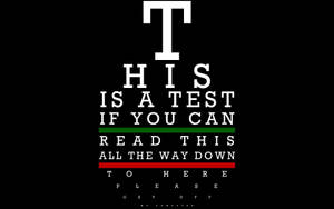 Simple Eye Test On Black Background Wallpaper