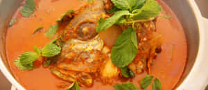 Singaporean Dish Fish Head Curry Close Up Shot Wallpaper