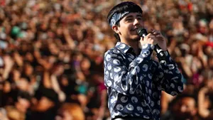 Singer Performingat Concert Wallpaper