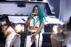 Singerwith Blue Hair Performance Wallpaper