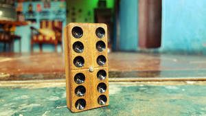 Single Wooden Domino Piece Wallpaper