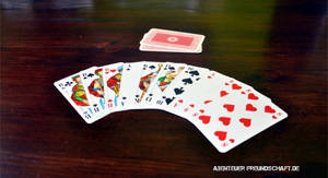 Skat Cards Spreadon Table Wallpaper