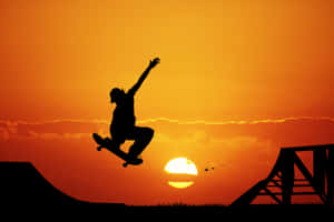 Skateboarder Sunset Silhouette Wallpaper