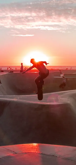 Skateboarder Sunset Silhouette Wallpaper