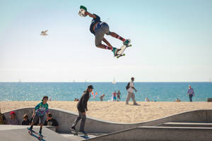 Skater Boy At The Beach Wallpaper