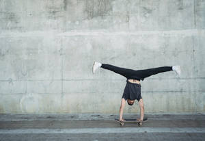 Skater Boy Handstand Trick Wallpaper