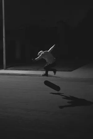 Skater Boy's Nighttime Ride Wallpaper