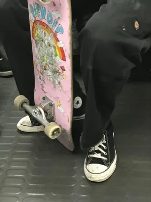 Skater Catching A Ride Wallpaper