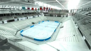 Skaters Enjoying A Day On The Ice Rink Wallpaper