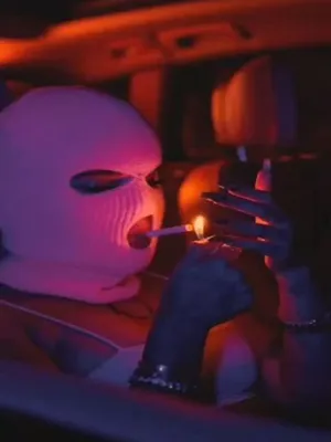 Ski Mask Girl Smoking In Car Wallpaper